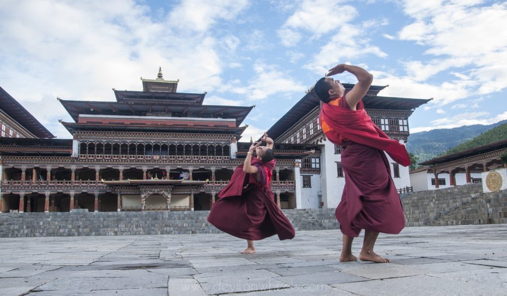 Dancing to the beats of Dragon in a monastery in Bhutan
