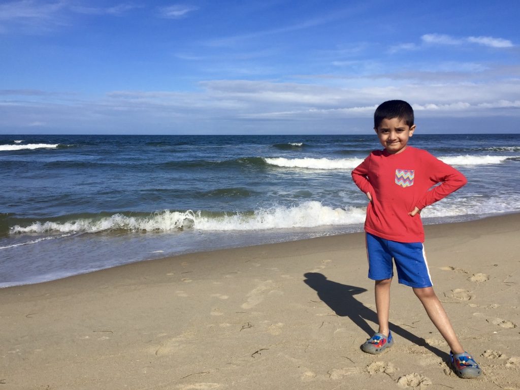 Kiddo excited being first time at the beach