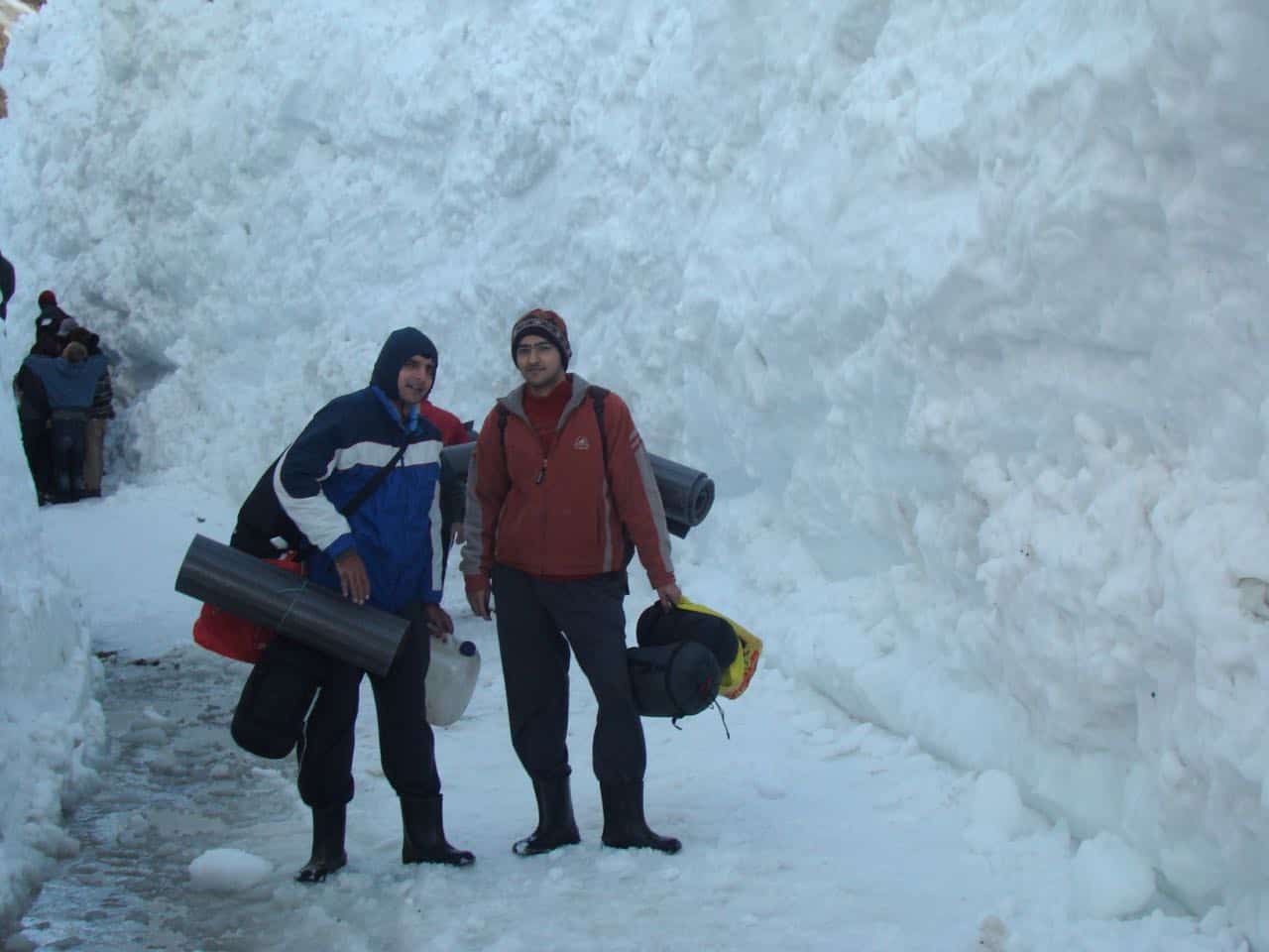 Trekker preparing gear before a Himalayan trek in Uttarakhand