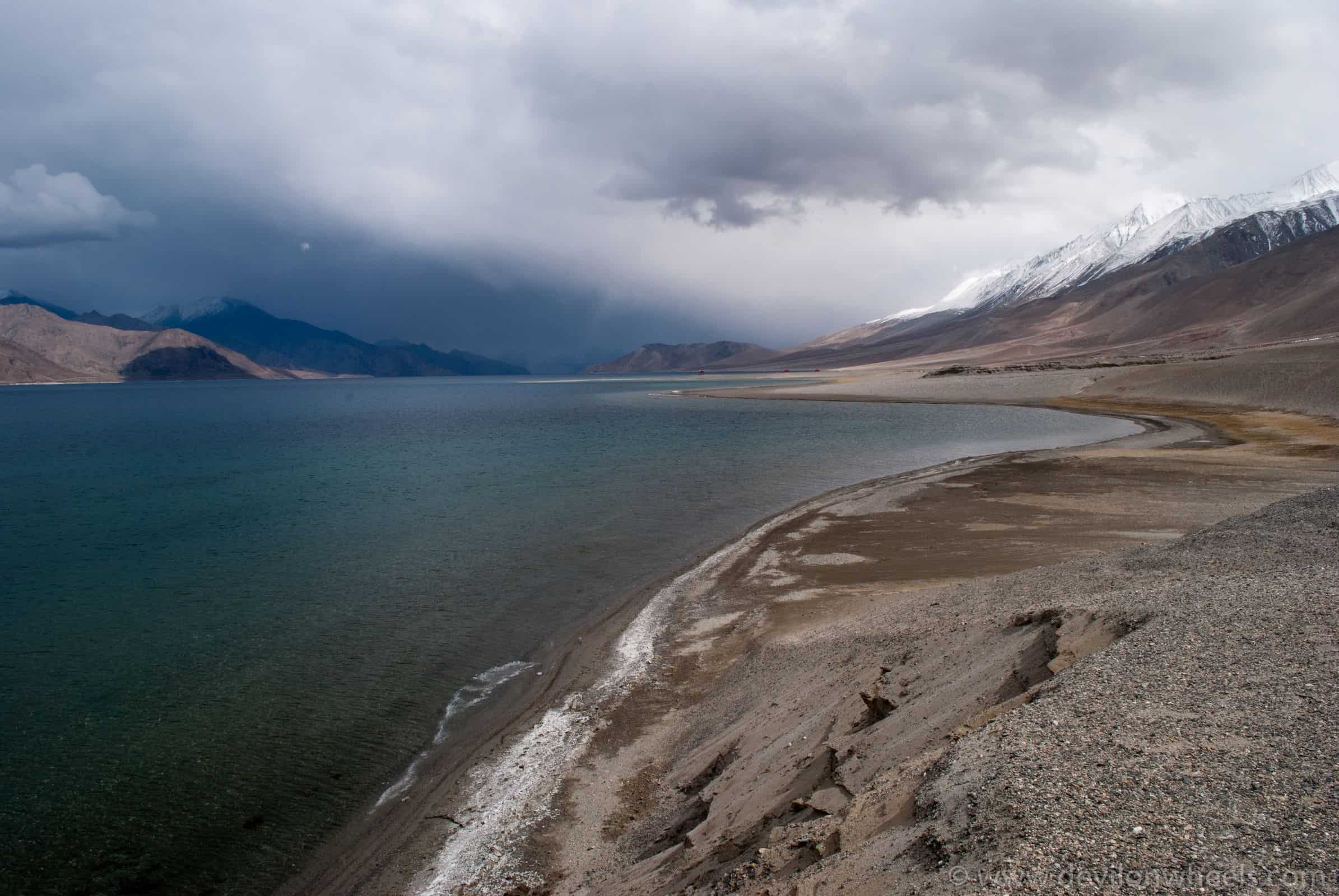 Pangong Tso south bank near Chusul showing the road along the lakeside and barren high-altitude terrain