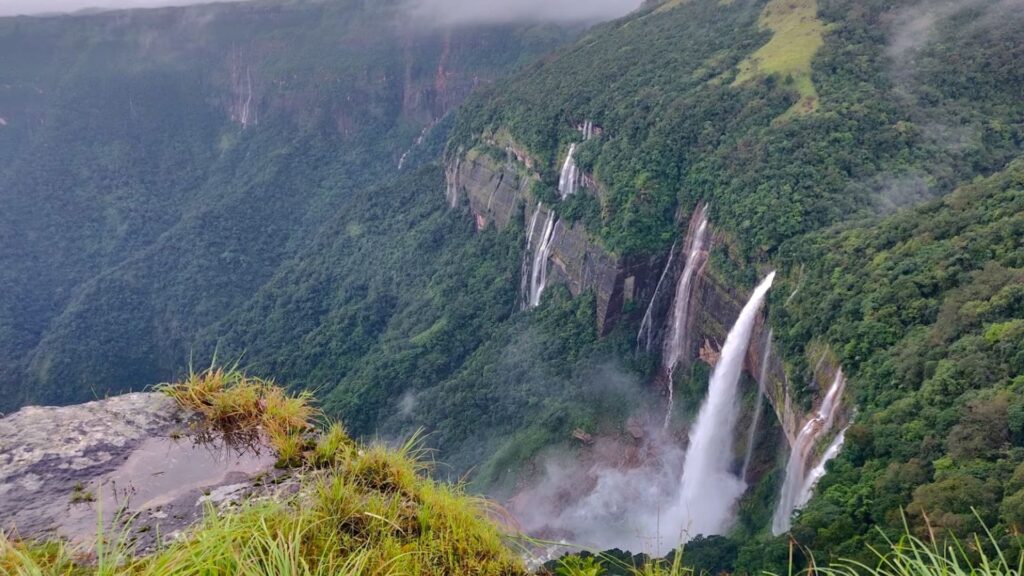Nohkalikai Falls plunging into a green pool near Sohra Cherrapunji Meghalaya