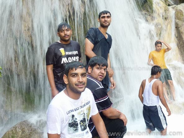 Getting Wet in Waterfall with Friends
