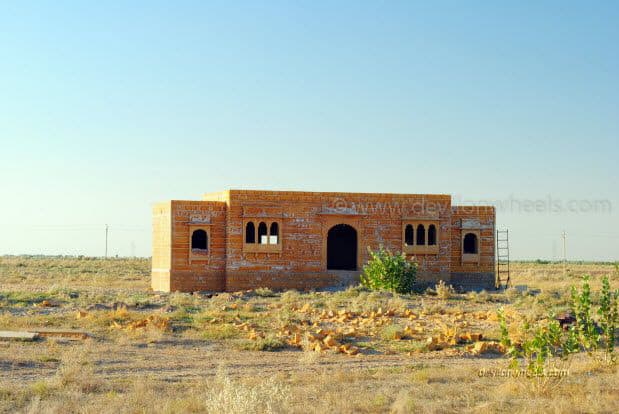 An empty house on a road from Bikaner to Jaiselmer