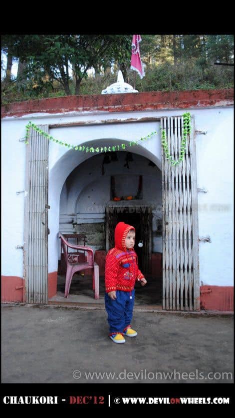 Junior standing at the entrance of Patal Bhuwaneshwar Cave