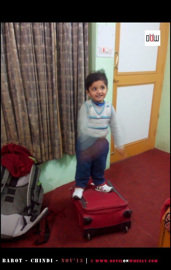 Junior playing in room in Barot